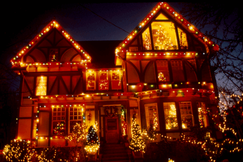 City of Lights decorated Victorian lit up at night